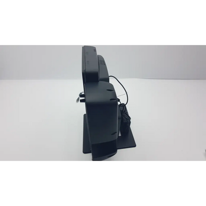 Black plastic cash register with built-in display and receipt printer in vecna medical kiosk with elo ac adapter