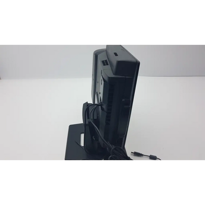 Back view of black plastic vecna medical system medical kiosk monitor with ventilation grilles and elo ac adapter da-150a12