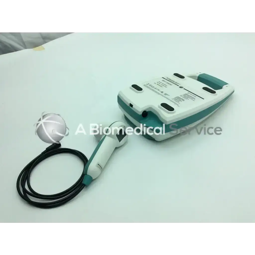 Teal and white verathon bladderscan bvi 9400 portable bladder scanner with coiled black cable handheld device