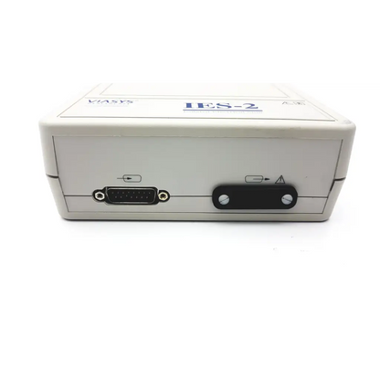 Off-white plastic viasys ies-2 isolated electrical stim device with black db9 serial port and power switch back view
