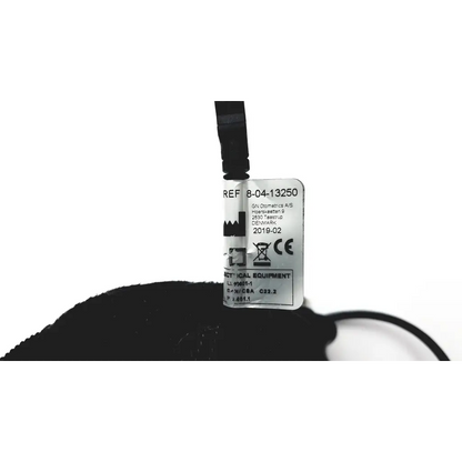 White rectangular label with black text and symbols attached to black cable of video otoscope otocam 300 g-bbhc3-1 model