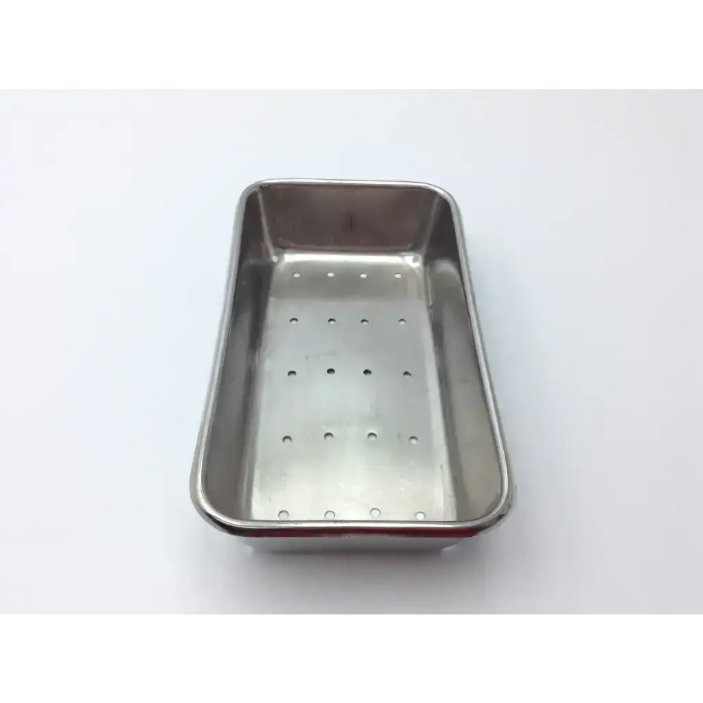 Rectangular vollrath stainless steel perforated instrument tray with evenly spaced holes for sterilization use