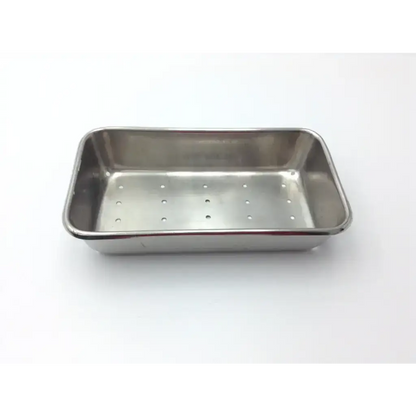 Rectangular vollrath stainless steel perforated instrument tray with evenly spaced holes for medical use
