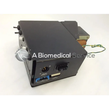 Black rectangular voltage dist medical device with matte finish showing labeled ports on back panel phase bbcb1