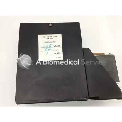Black rectangular voltage dist assembly with white label and biomedical service text for 208v 60 hz 1 phase bbcb1