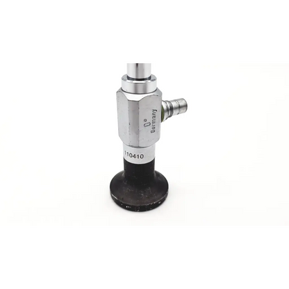 Silver metallic valve with black rubber base and side port marked germany model 1104-10 for cystoscope da46-90