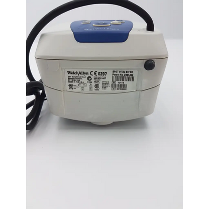 Welch allyn 42ntb spot vital signs monitor in white and blue with black carrying handle for easy transport