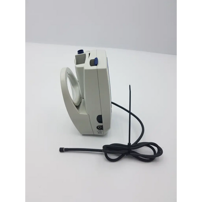 White plastic handheld welch allyn 42ntb spot vital signs monitor with circular loop blue buttons and coiled black cable