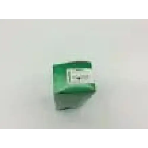Translucent green glass cube with white label on side shown as the back of welch allyn 69063 mac fiber optic laryngoscope blade