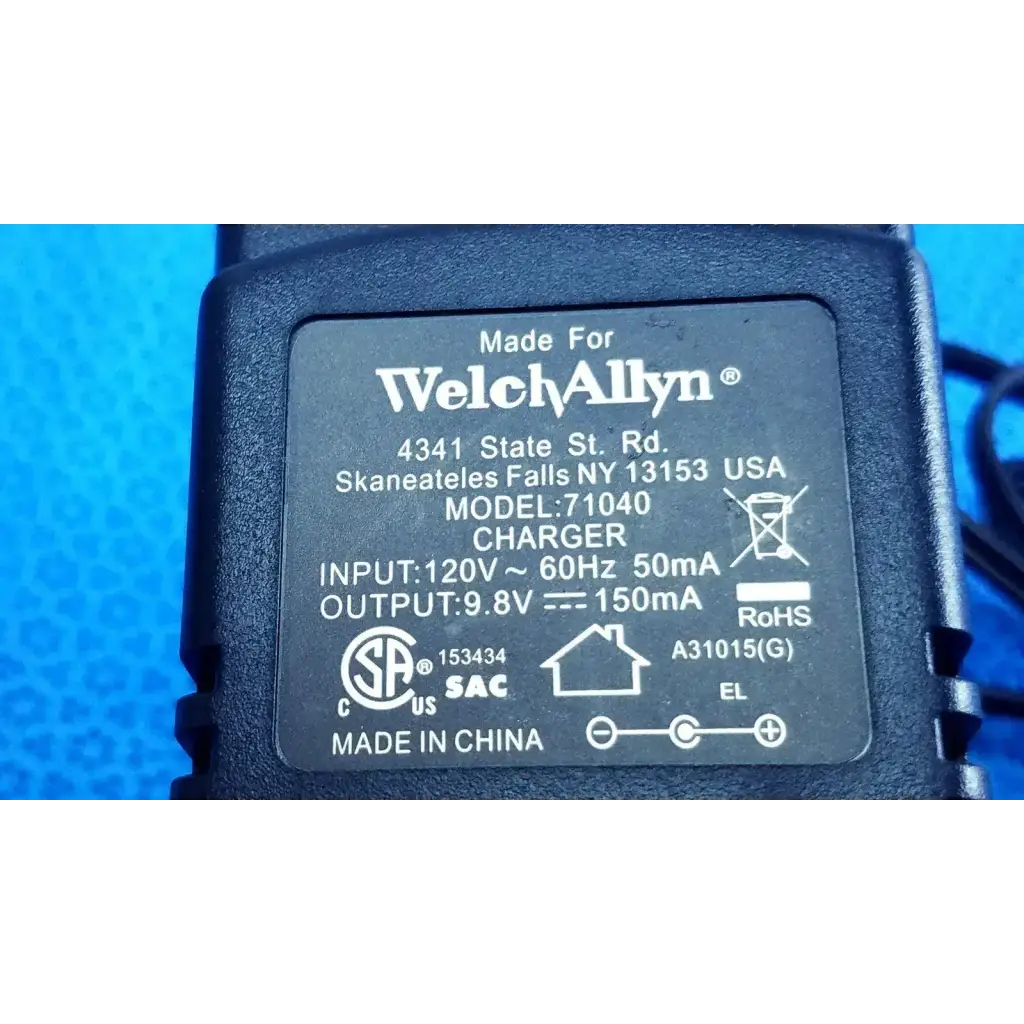 Black plastic welch allyn 71040 transformer adapter power supply charger with white labeling for medical devices