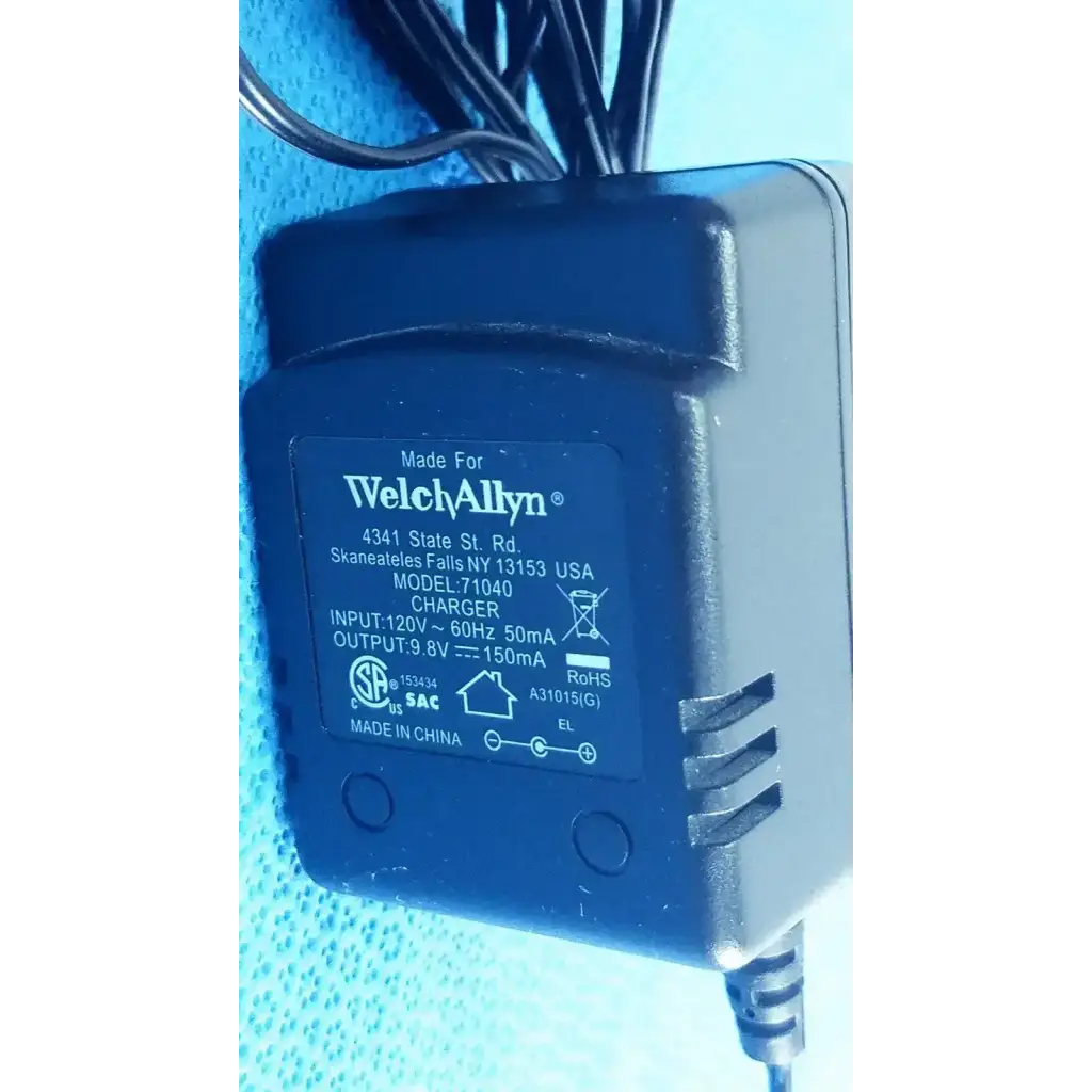 Black plastic welch allyn 71040 transformer adapter power supply charger with matte finish and visible input output label