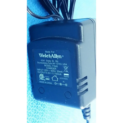 Black plastic welch allyn 71040 transformer adapter power supply charger with matte finish and visible input output label