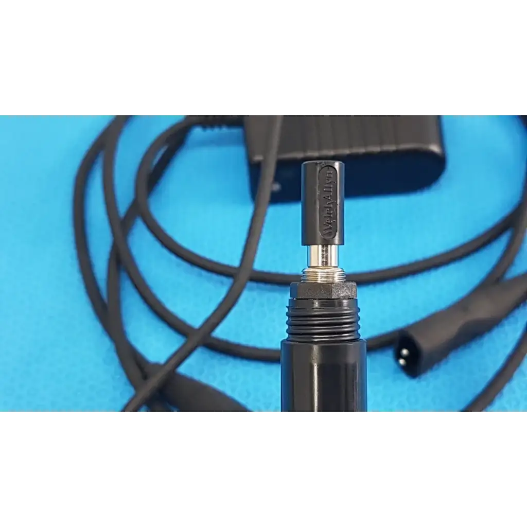 Welch allyn 73305 black cylindrical power adapter plug with metallic threaded connection and embossed brand name