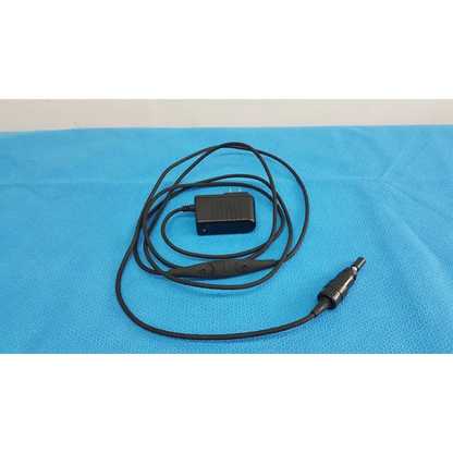 Black coiled cable with rectangular power adapter plug for welch allyn 73305 6v medical device power adapter