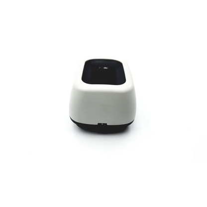 Welch allyn 739 series charger with a sleek white and black compact barcode scanner for efficient scanning use