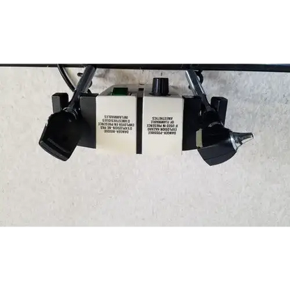 Black and white welch allyn 74710 wall transformer industrial control panel with labeled switches and knobs for reuse medical
