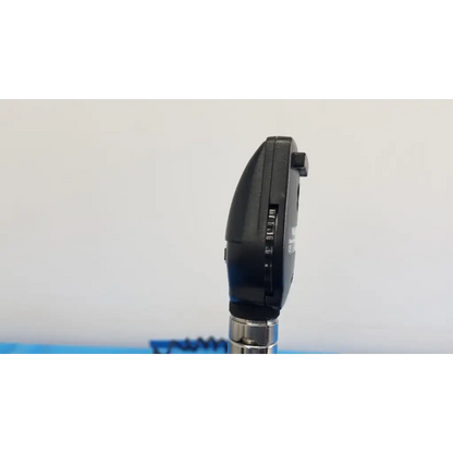 Black plastic otoscope with silver metallic stem as part of welch allyn 767 series wall transformer set