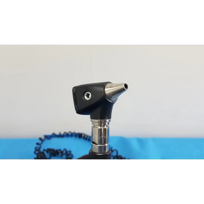 Black and silver welch allyn 767 series wall transformer otoscope with textured grip metallic tip and coiled cable