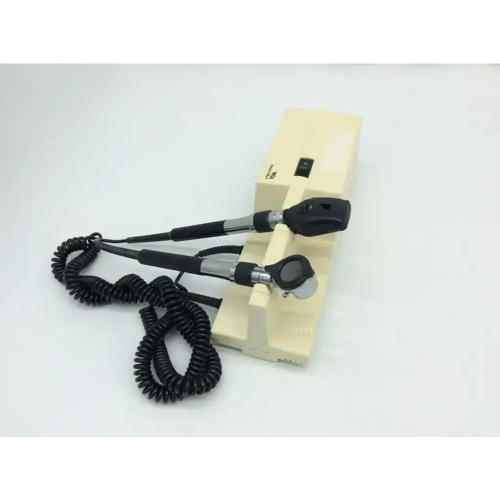 Cream-colored welch allyn 767 series wall transformer with otoscope and ophthalmoscope heads with black handles and cords