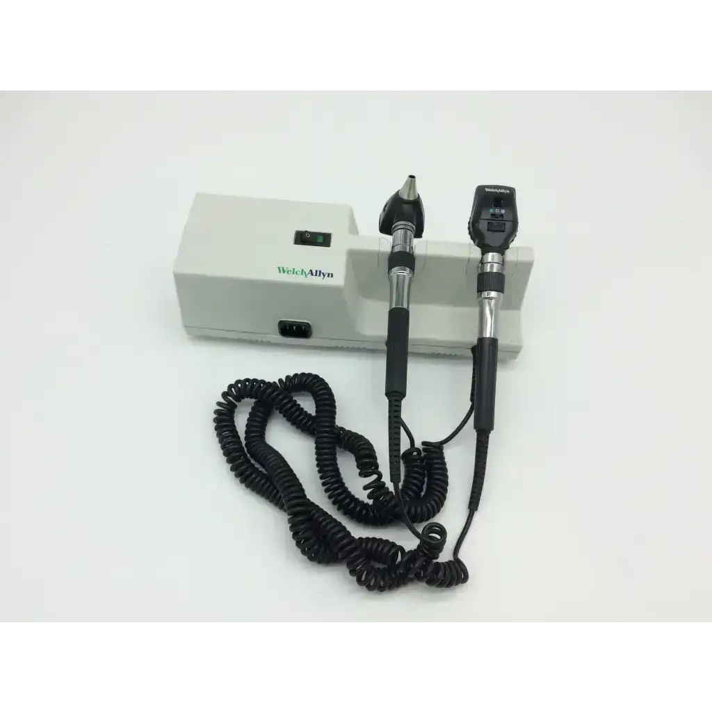 Welch allyn 767 wall transformer 25020a otoscope with black silver handles connected to white power unit by coiled cable