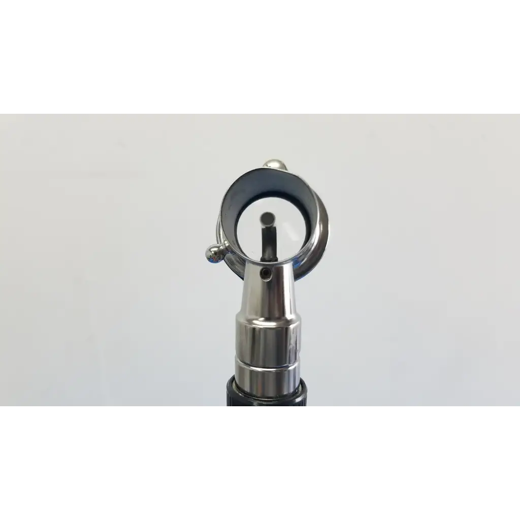 Silver-toned welch allyn otoscope with circular lens and adjustable headpiece for wall transformer reuse medical setup
