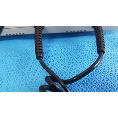 Black coiled cable with textured ribbed connectors for welch allyn wall transformer used in reuse medical devices