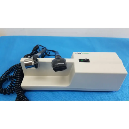 White rectangular Welch Allyn wall transformer with black coiled cables and coaxial ophthalmoscope metallic probe attachment