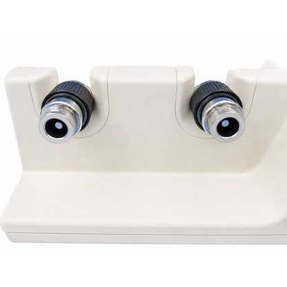 Cream-colored welch allyn 76710 diagnostic handle charging station with dual eyepieces for handle charging station use