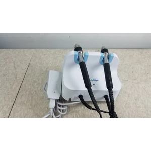 White plastic base with two black-handled light blue dental handpieces attached to welch allyn wall transformer integrated system