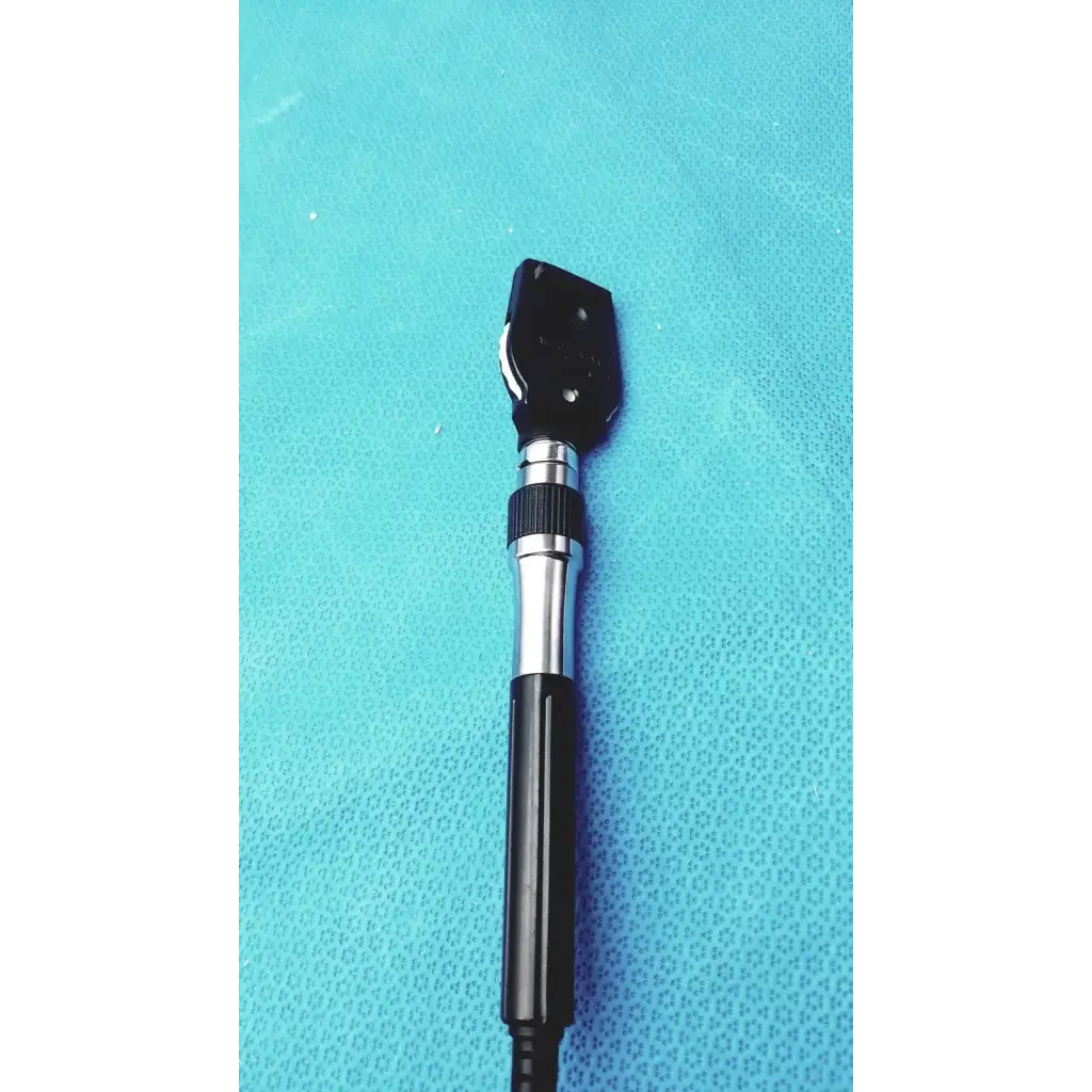 Black and silver handheld ophthalmoscope with textured grip for Welch Allyn wall transformer medical reuse