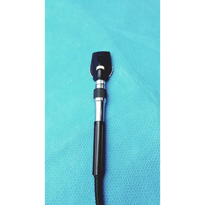 Black and silver welch allyn ophthalmoscope otoscope with textured grip handle for wall transformer use