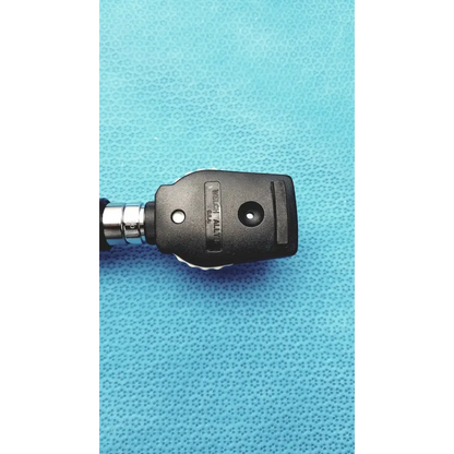 Black plastic and metal welch allyn ophthalmoscope head with textured grip for wall transformer reuse medical use