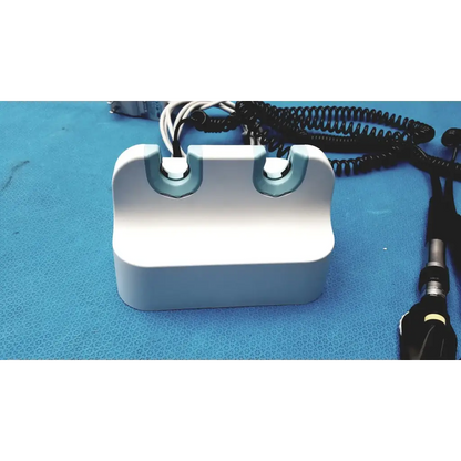 Welch allyn GS 777 wall transformer reuse medical device white plastic with light blue accents and two curved slots