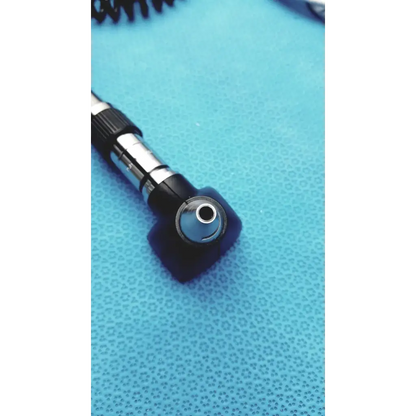 Black and silver welch allyn otoscope with coiled cord for wall transformer reuse medical applications