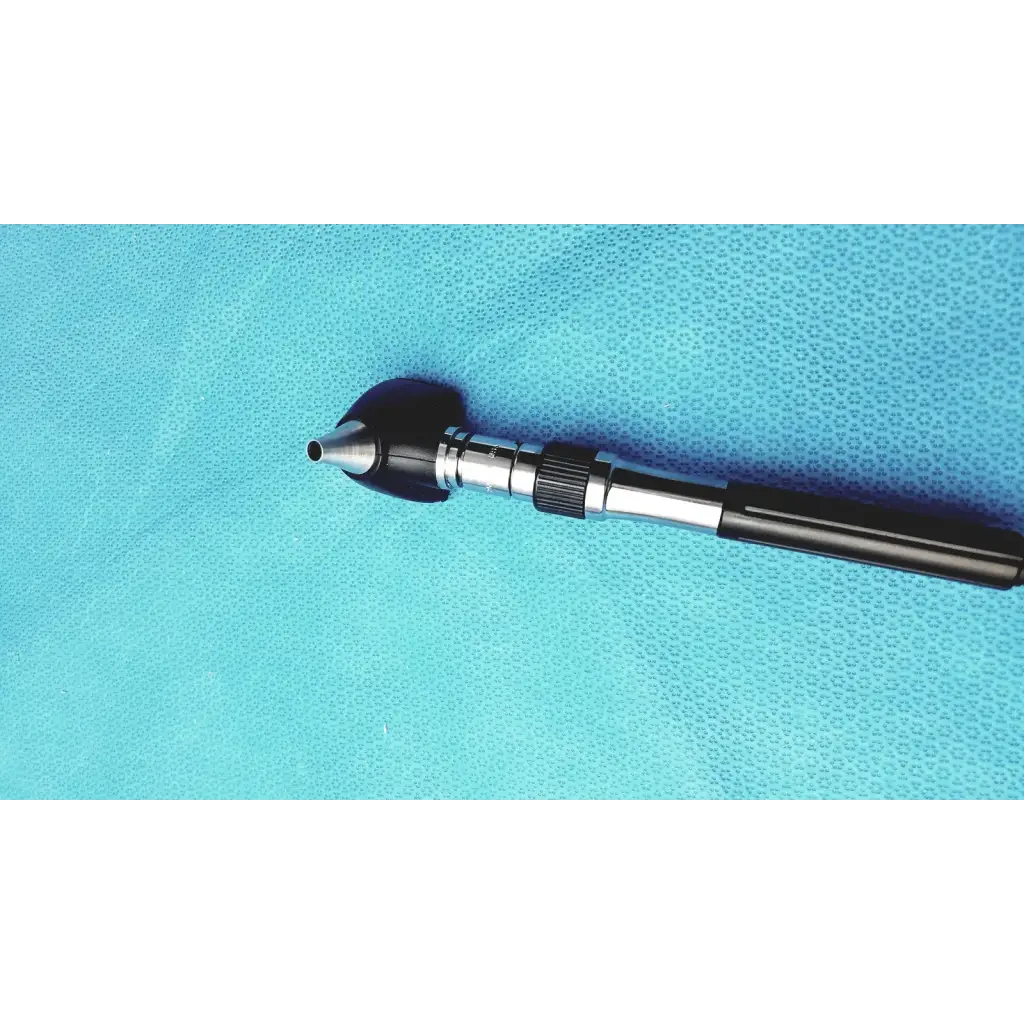 Welch allyn GS 777 wall transformer with black and silver ophthalmoscope otoscope featuring a textured grip