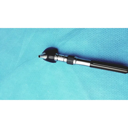 Welch allyn GS 777 wall transformer with black and silver ophthalmoscope otoscope featuring a textured grip
