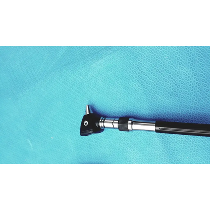 Welch allyn wall transformer with black and silver otoscope featuring a textured grip handle for reuse medical use