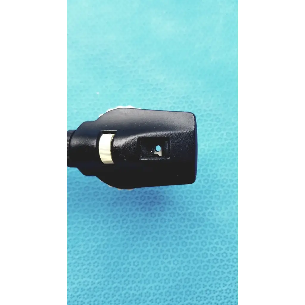 Black plastic Welch Allyn otoscope with white adjustment ring and blue light for wall transformer reuse medical use