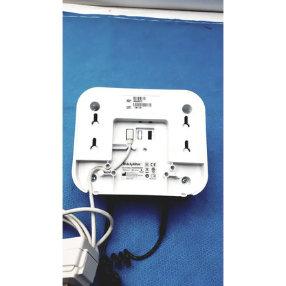 White plastic welch allyn gs 777 wall transformer with ophthalmoscope otoscope wireless coiled cable and power adapter