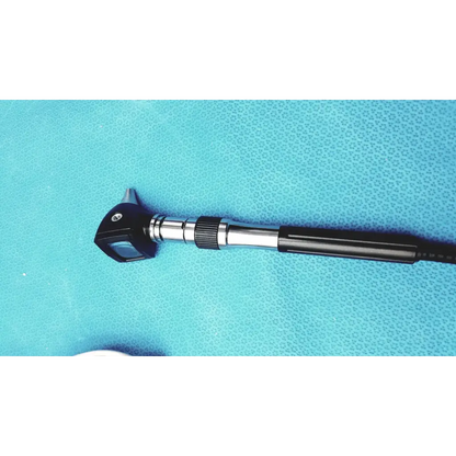 Black and silver welch allyn ophthalmoscope otoscope with textured grip handle, part of gs 777 wall transformer system