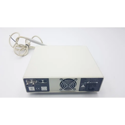 Back side of cream-colored welch allyn reveal solo dcu-2000 dental camera video system with ventilation grille and ports