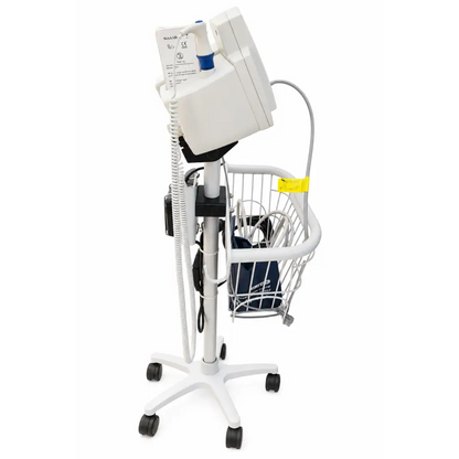 White welch allyn vital signs monitor mounted on wheeled cart with wire basket and accessories