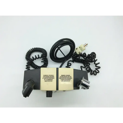 Black and cream welch allyn wall transformer 74710 diagnostic set ophthalmoscope with coiled black power cords