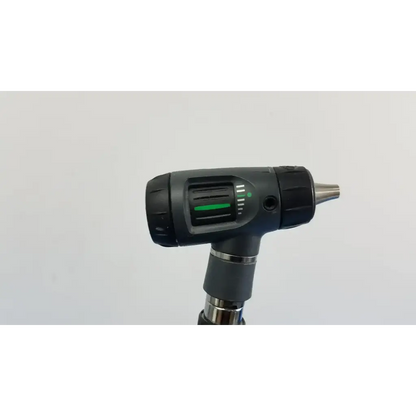 Black and silver cordless drill with green power indicator light next to welch allyn wall transformer with 11720 heads