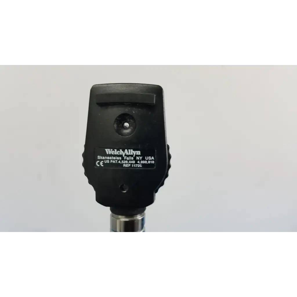 Welch allyn wall transformer with black matte finish ophthalmoscope and metallic stem for medical use