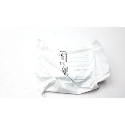 A crumpled white plastic package containing a medical face mask with welchallyn blood pressure reusable cuff 901043