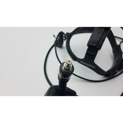 Black welchallyn headlight with fibrotic cable black and metallic connector featuring branded label on cable black