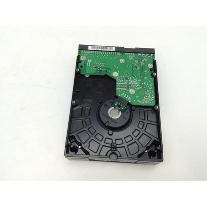 Black internal hard drive with green circuit board and metallic platter western digital caviar blue wd400jb 7200rpm 3.5