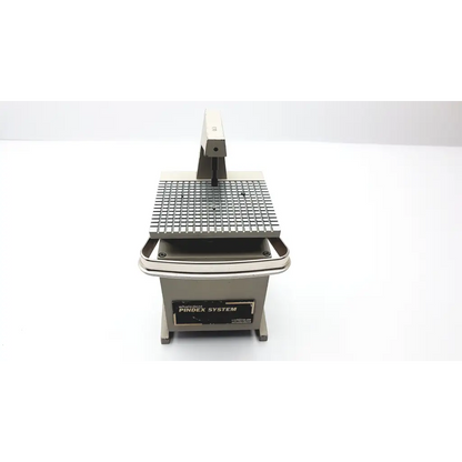 Silver metallic whaledent pindex system px-110 dental laser drilling system with grid-patterned work surface and vertical arm