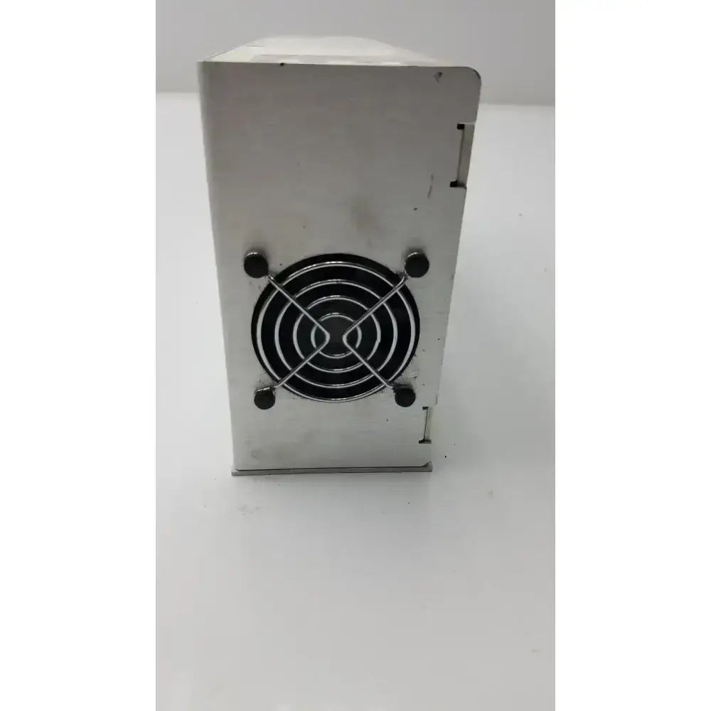 Silver metallic rectangular x power 40-52154-001 rev e power supply with black circular fan grille for compatible equipment connection